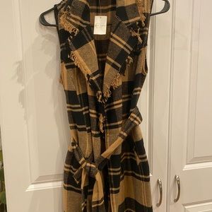 Small plaid brown/ black vest- smoke free home